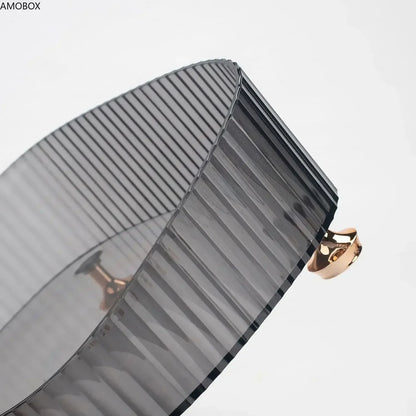 TRANSPARENT ORGANIZER BOX WITH GOLD-PLATED LEGS