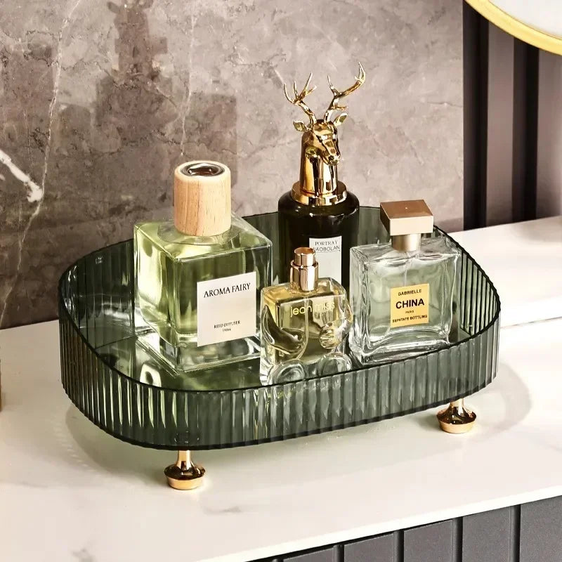 TRANSPARENT ORGANIZER BOX WITH GOLD-PLATED LEGS