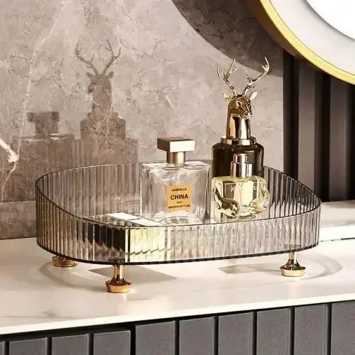 TRANSPARENT ORGANIZER BOX WITH GOLD-PLATED LEGS