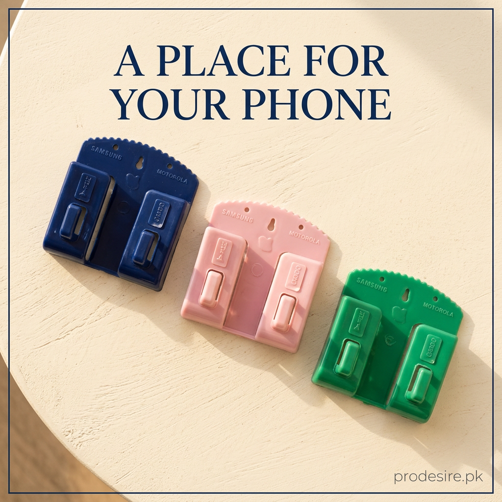 Overhead arrangement of dark blue pink and green folding wall phone holders