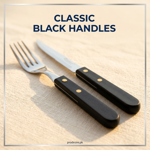 Close-up of black cutlery handles with two gold-coloured rivets on a matching fork and knife