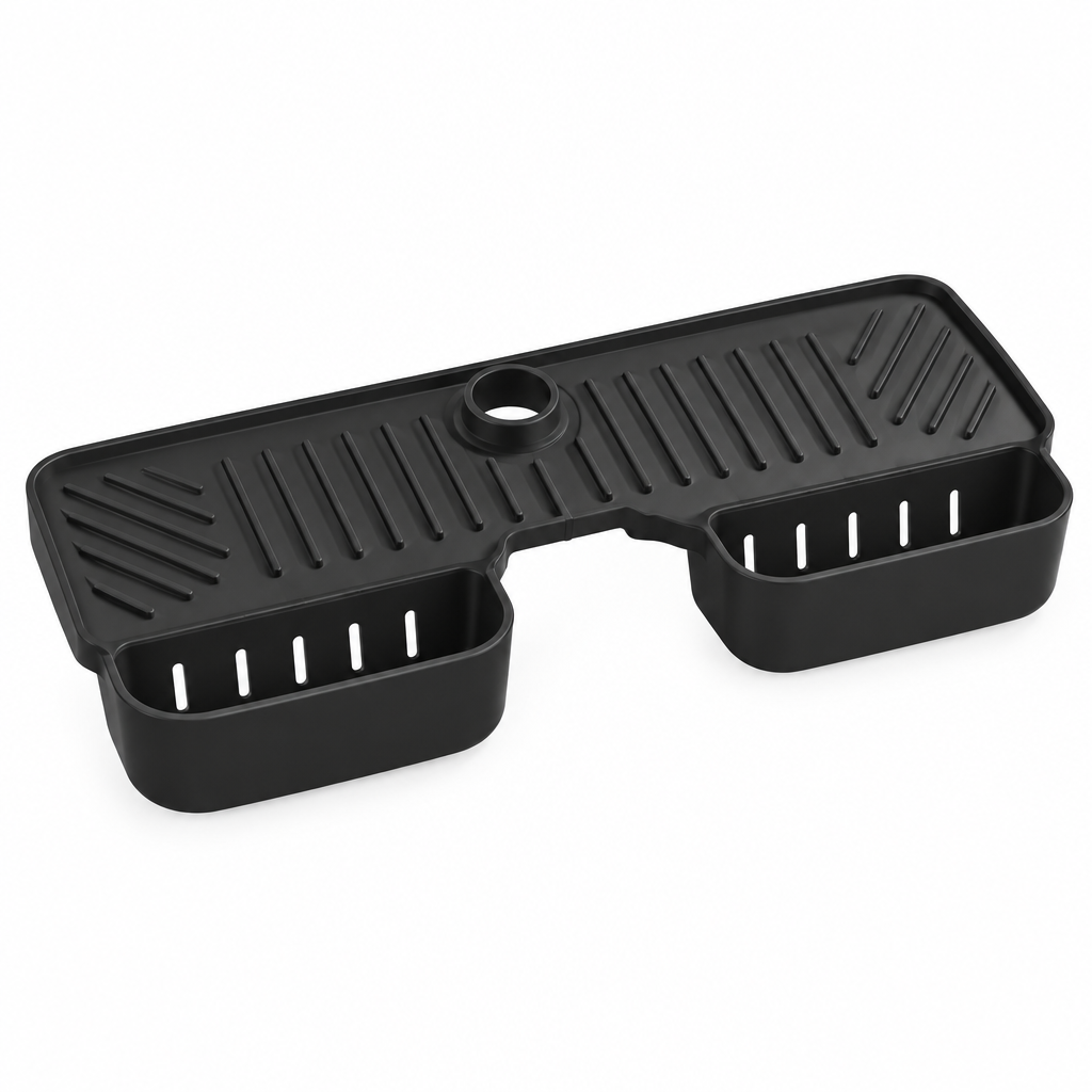 Black silicone sink mat with sponge holders on white background