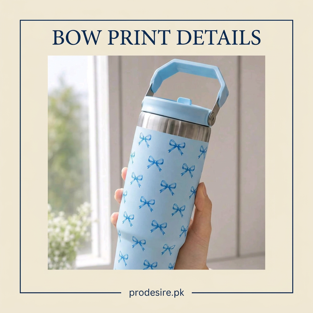 Close-up of blue bow printed tumbler showing steel band and top carry handle
