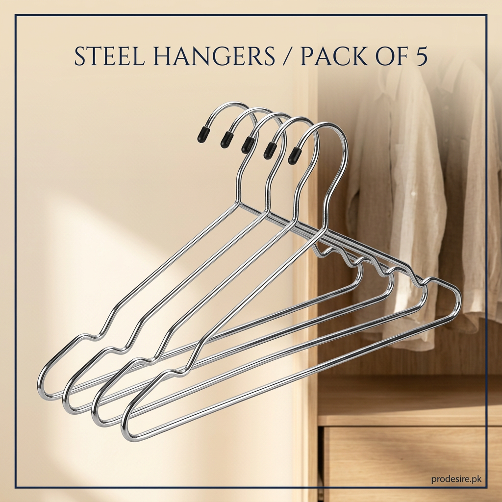 Pack of five silver steel clothes hangers with black hook tips against a cream wardrobe
